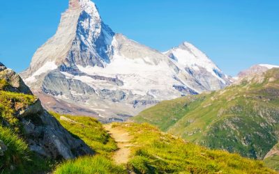 Europaweg-trail-leads-the-eye-trough-lush-green-meadows-to-the-distant-Matterhorn-1